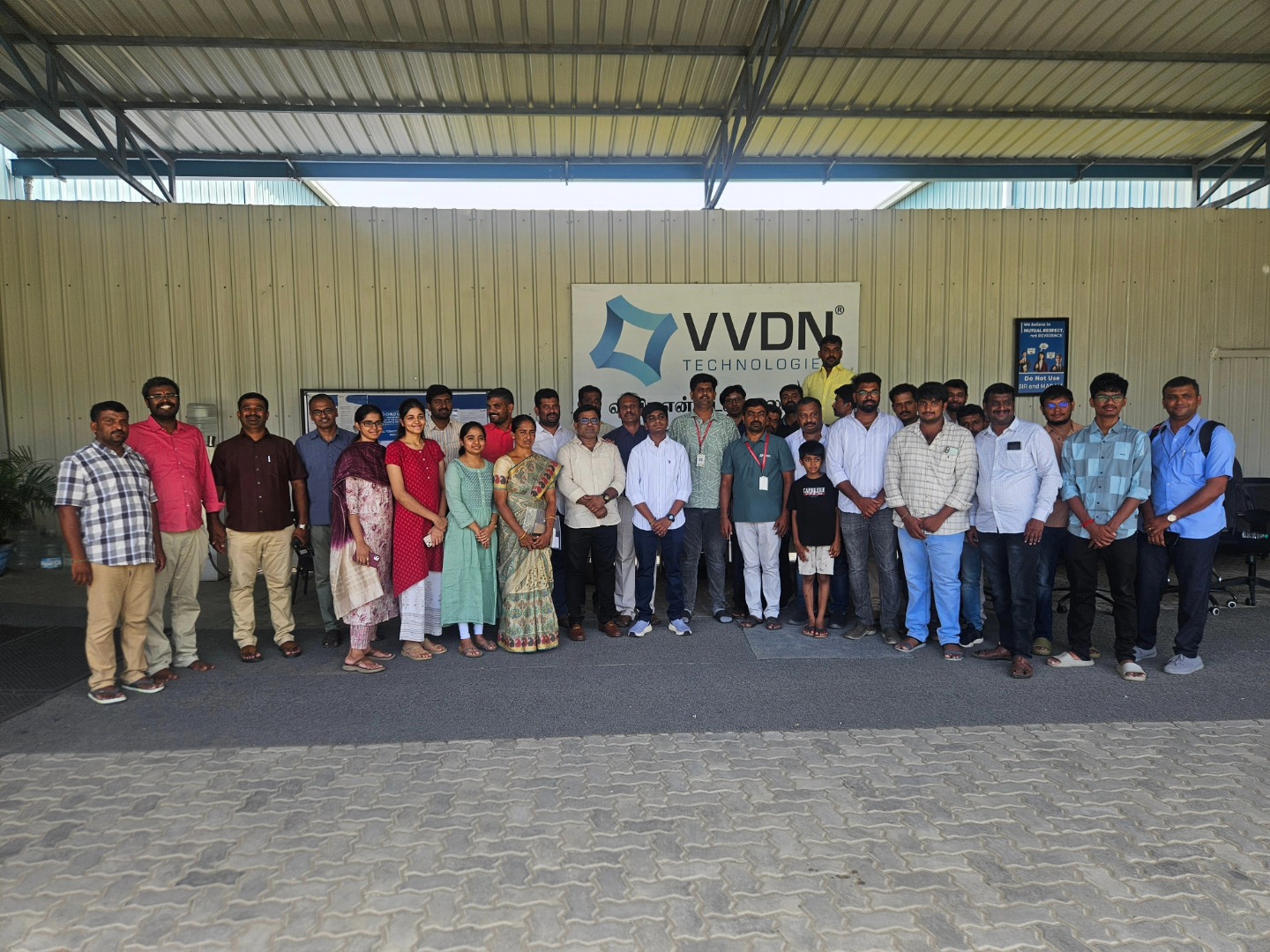 Engineers walking through labs during VVDN Technologies visit